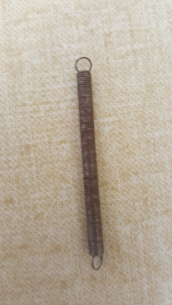 Spring before - corroded and damaged